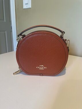 Coach Tan Pebbled Leather Round Crossbody Bag with Gold Hardware